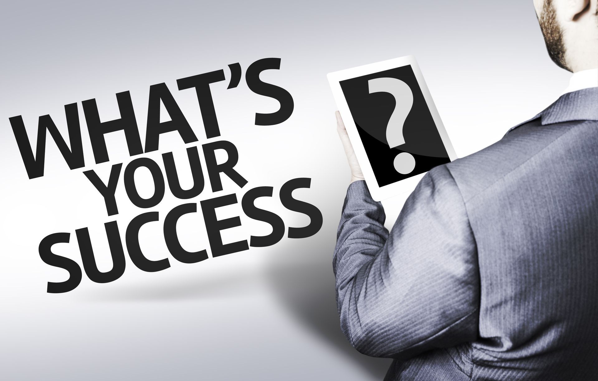 Business man with the text What's your Success? in a concept image